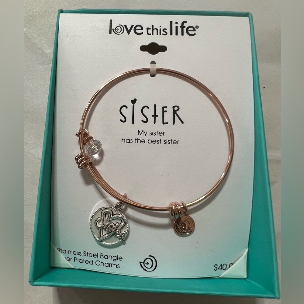 Stainless steel charms bracelet NWT priced $40